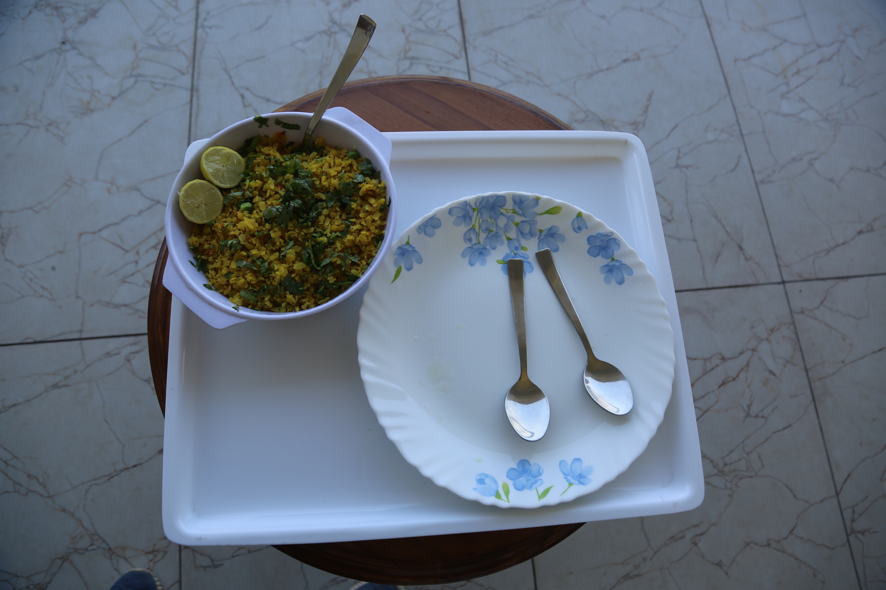 Hot Indian breakfast and paratha platter at Hotel Kuber Residency Dwarka Sector 9